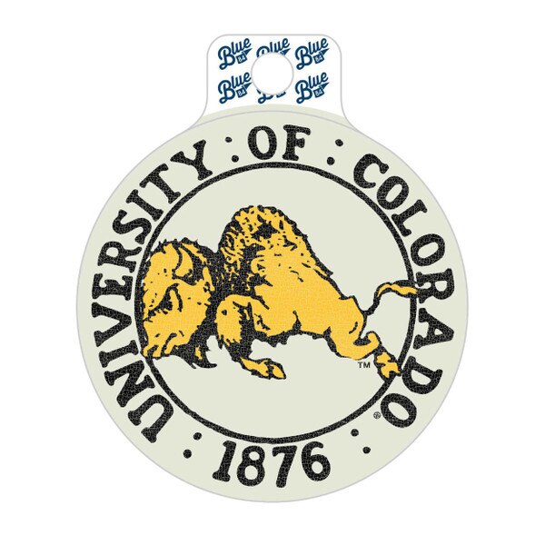 This is a circular sticker with a white background. University of Colorado is written around the top of the border, and 1876 is written at the bottom. There is a vintage golden buffalo in the center.